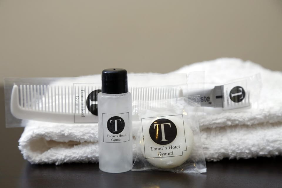 Shower, free toiletries, hair dryer, slippers