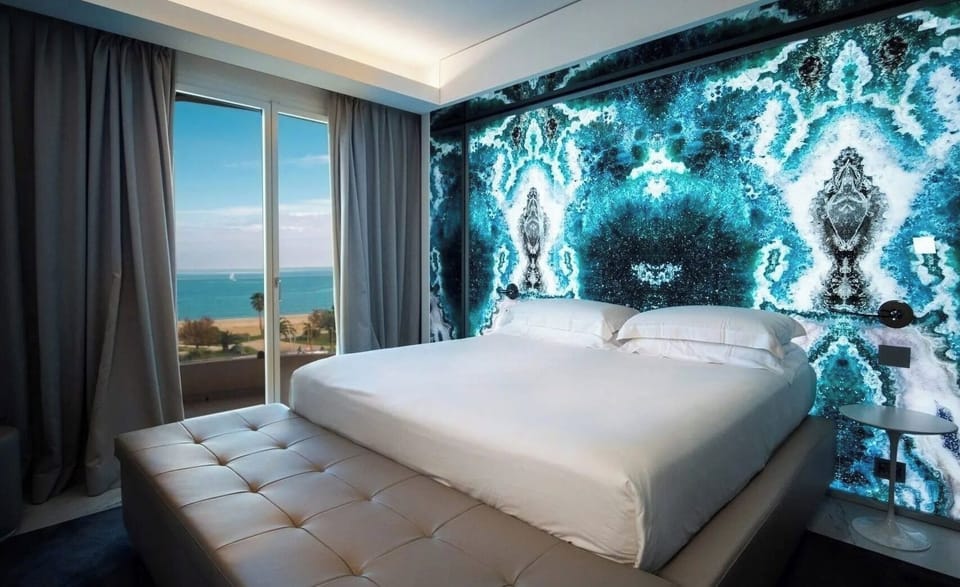 Premium bedding, down comforters, memory foam beds, minibar