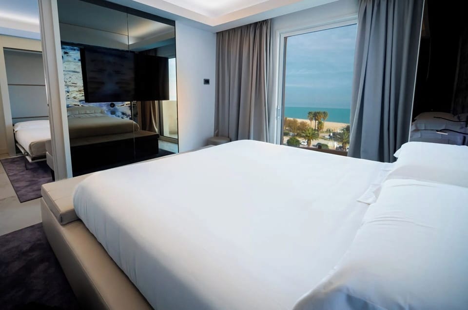 Premium bedding, down comforters, memory foam beds, minibar