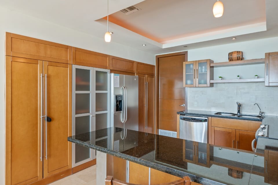 Condo | Private kitchen | Full-size fridge, microwave, oven, stovetop