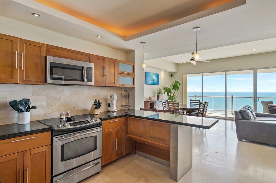 Condo | Private kitchen | Full-size fridge, microwave, oven, stovetop