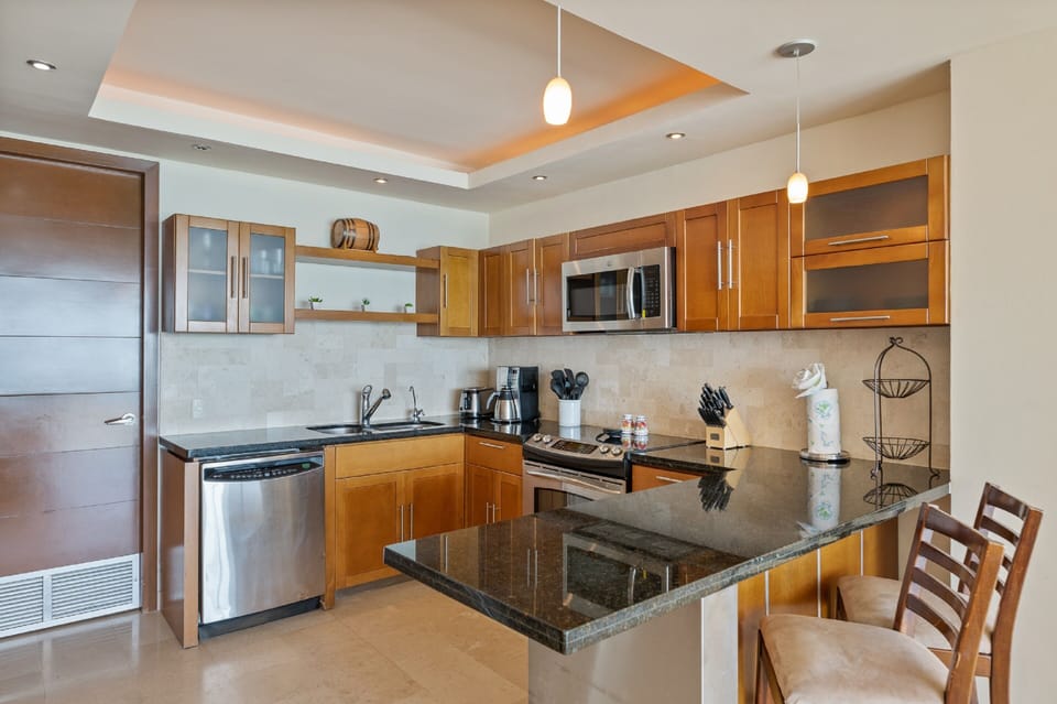 Condo | Private kitchen | Full-size fridge, microwave, oven, stovetop