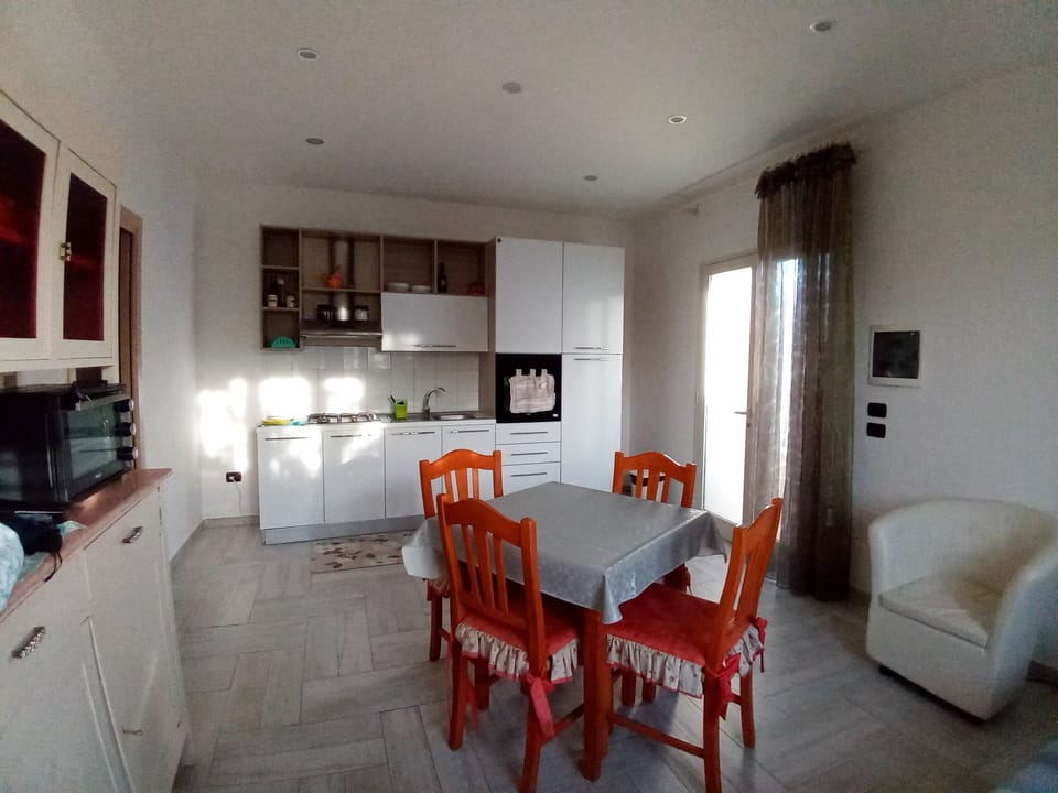Standard Apartment, Kitchenette (Perla) | Living area | Flat-screen TV