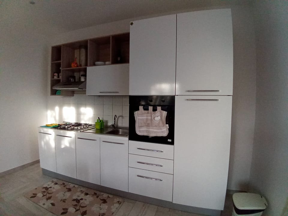 Standard Apartment, Kitchenette (Perla) | Living area | Flat-screen TV