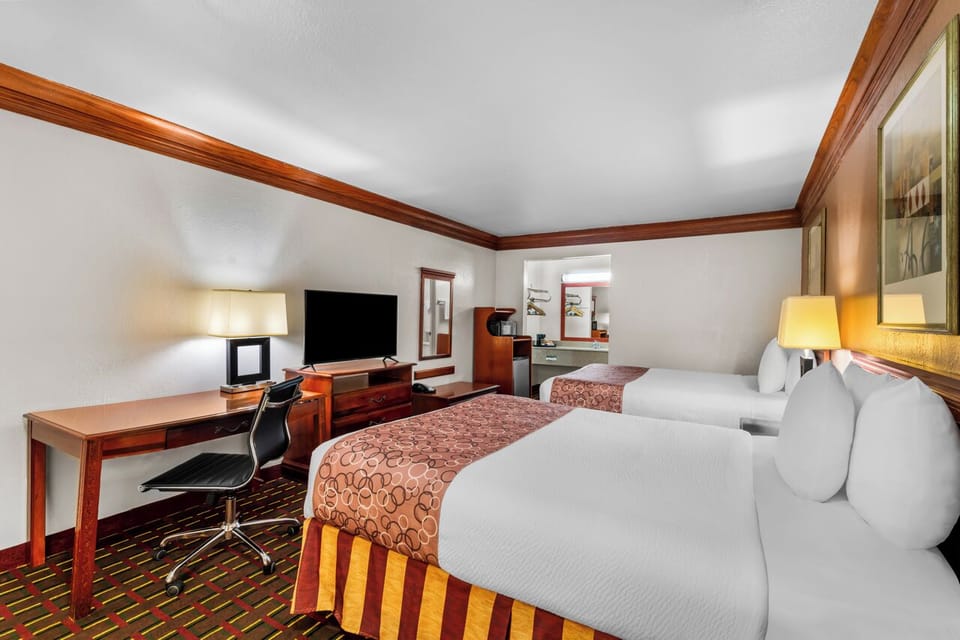 Room, 2 Queen Beds, Non Smoking | Premium bedding, iron/ironing board, WiFi (free), bed sheets