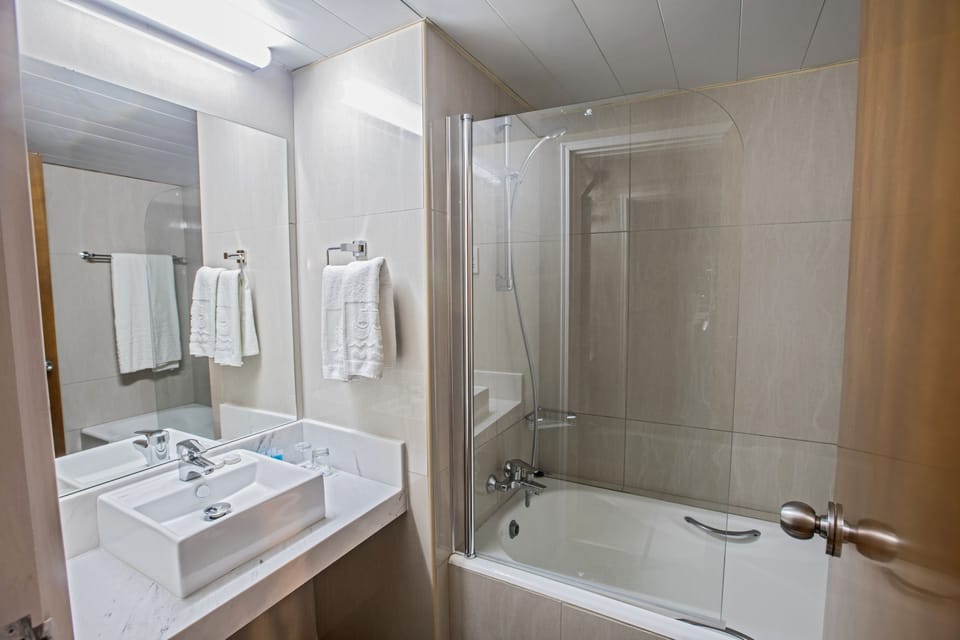 Hair dryer, towels, shampoo