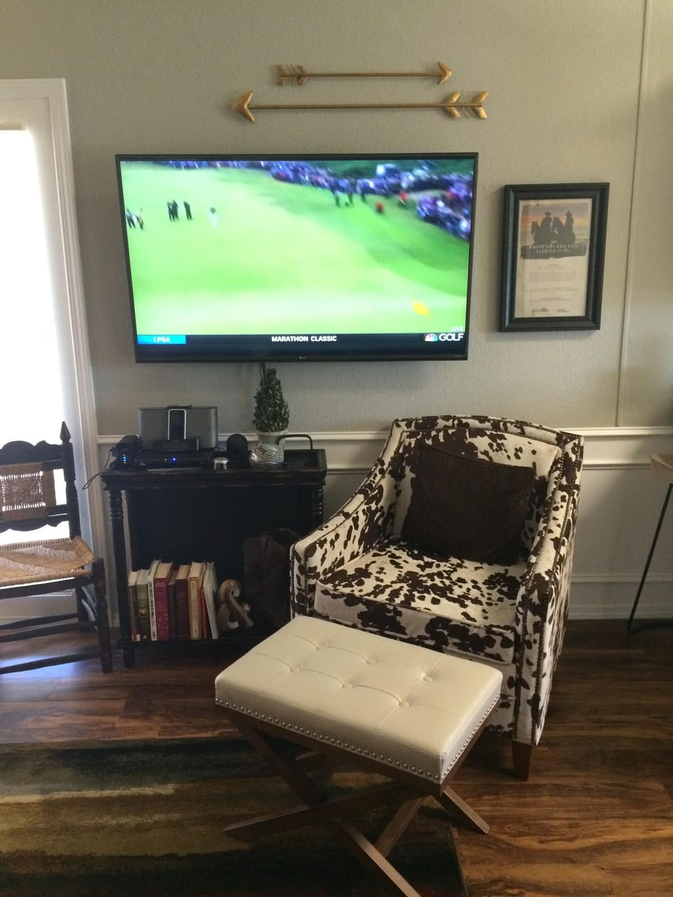 A 55” TV for relaxing with movie and sports options.