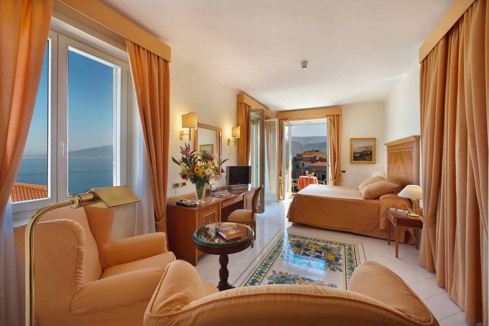 Junior Suite, Balcony, Sea View | Premium bedding, minibar, in-room safe, desk
