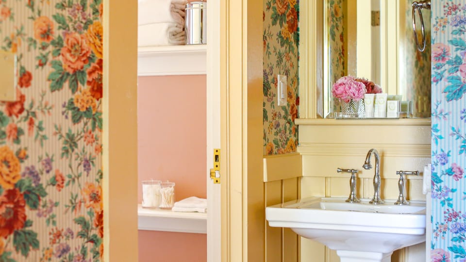 Shower, designer toiletries, hair dryer, bathrobes