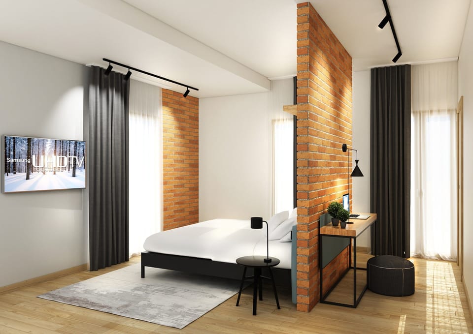 Junior Suite, 1 Queen Bed, Terrace | Minibar, in-room safe, soundproofing, cribs/infant beds