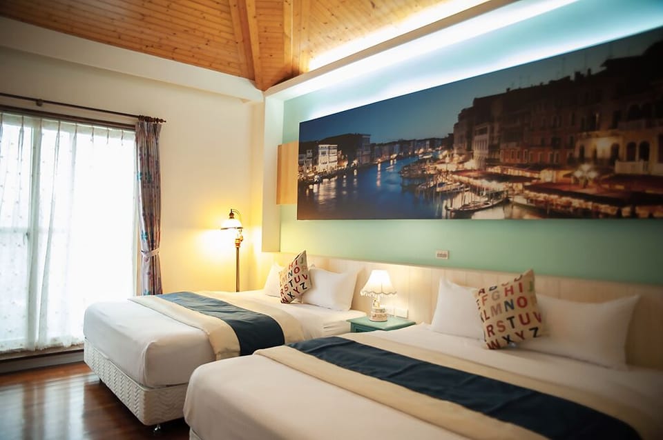Comfort Quadruple Room | Premium bedding, down comforters, individually decorated