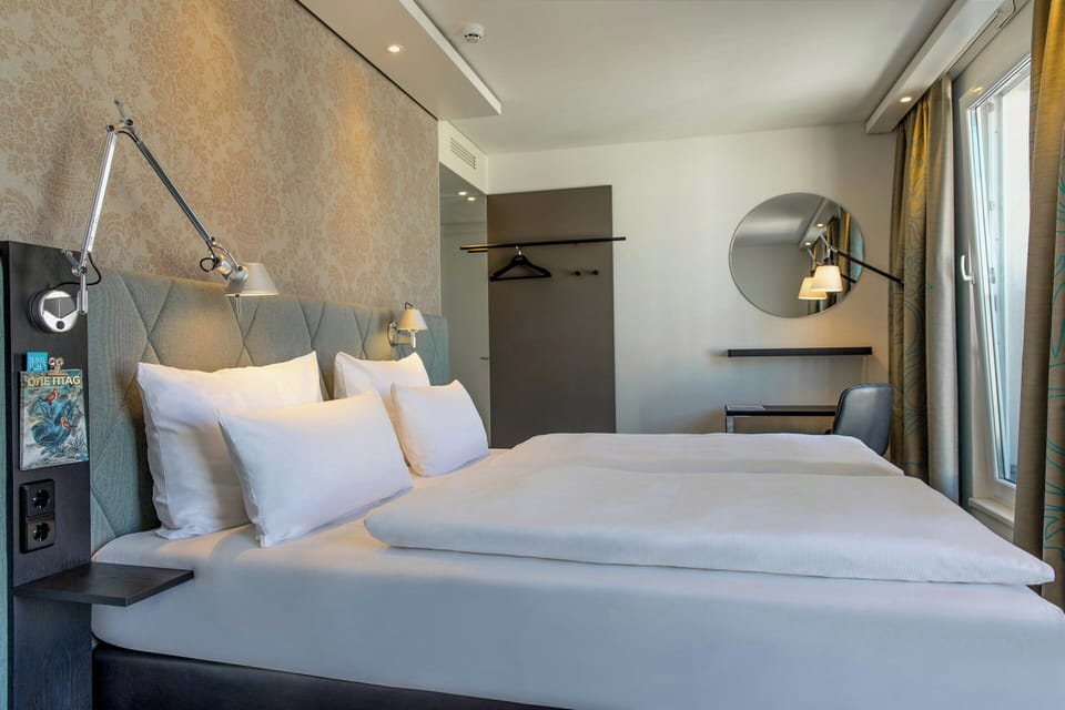 Hypo-allergenic bedding, desk, blackout drapes, soundproofing