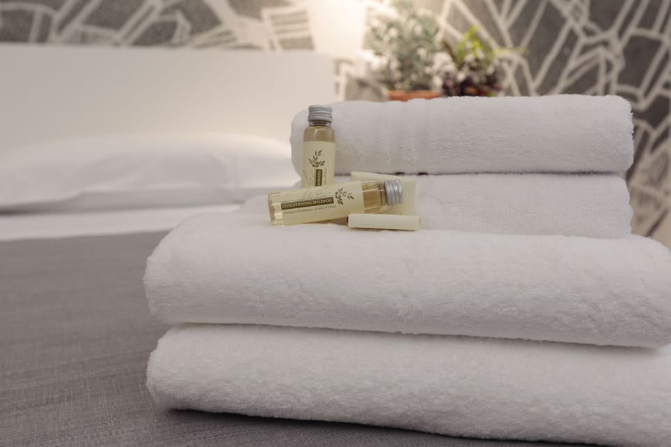 City Quadruple Room | Premium bedding, memory foam beds, minibar, in-room safe