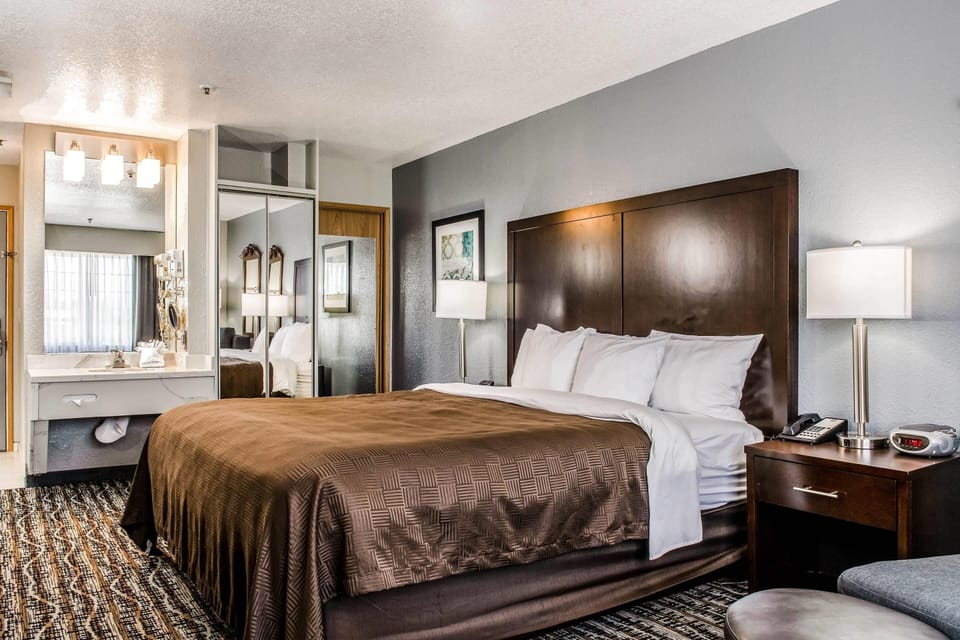 Pillowtop beds, desk, blackout drapes, iron/ironing board