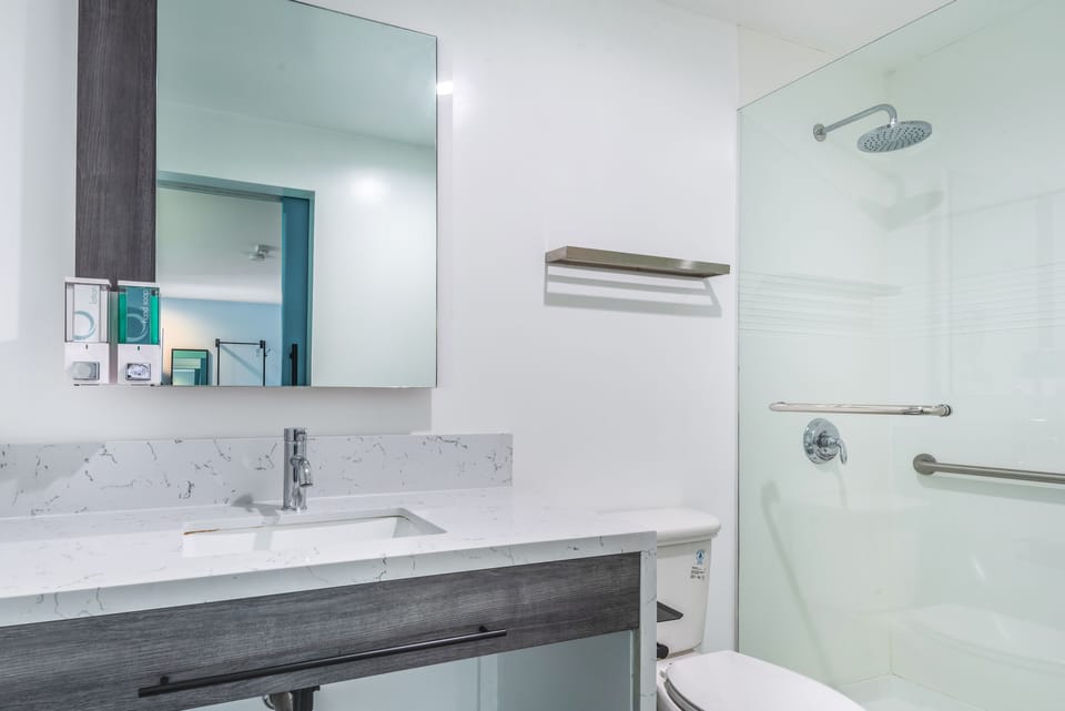 Room, 2 Queen Beds | Bathroom | Shower, rainfall showerhead, hair dryer, towels