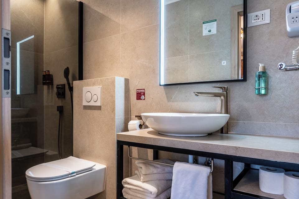 Shower, free toiletries, hair dryer, bathrobes