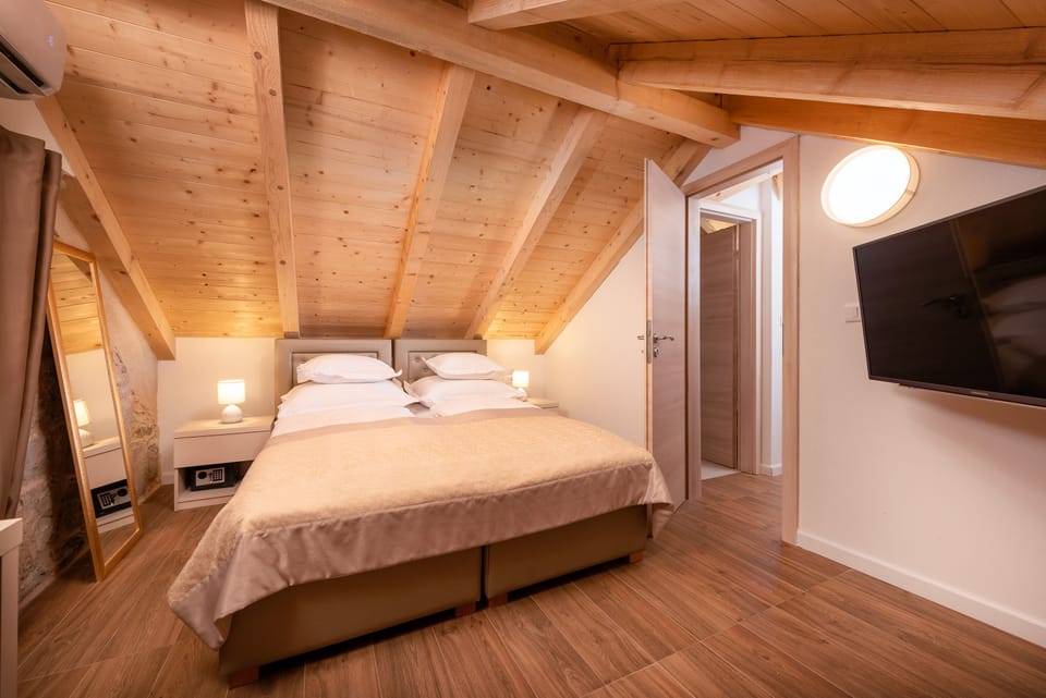 Premium bedding, down comforters, memory foam beds, minibar