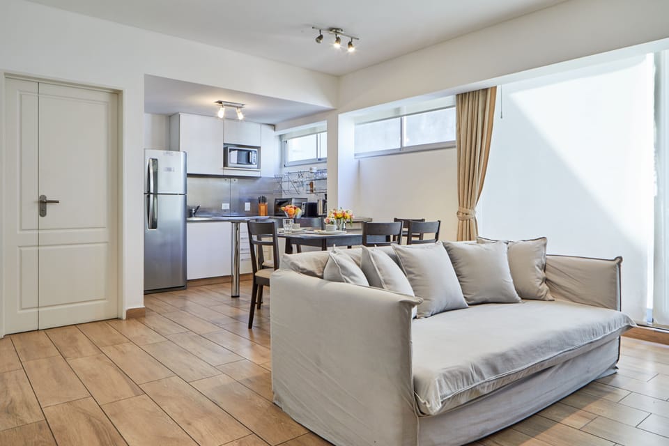 Apartment, 2 Bedrooms | Living area | 40-inch Smart TV with cable channels, TV