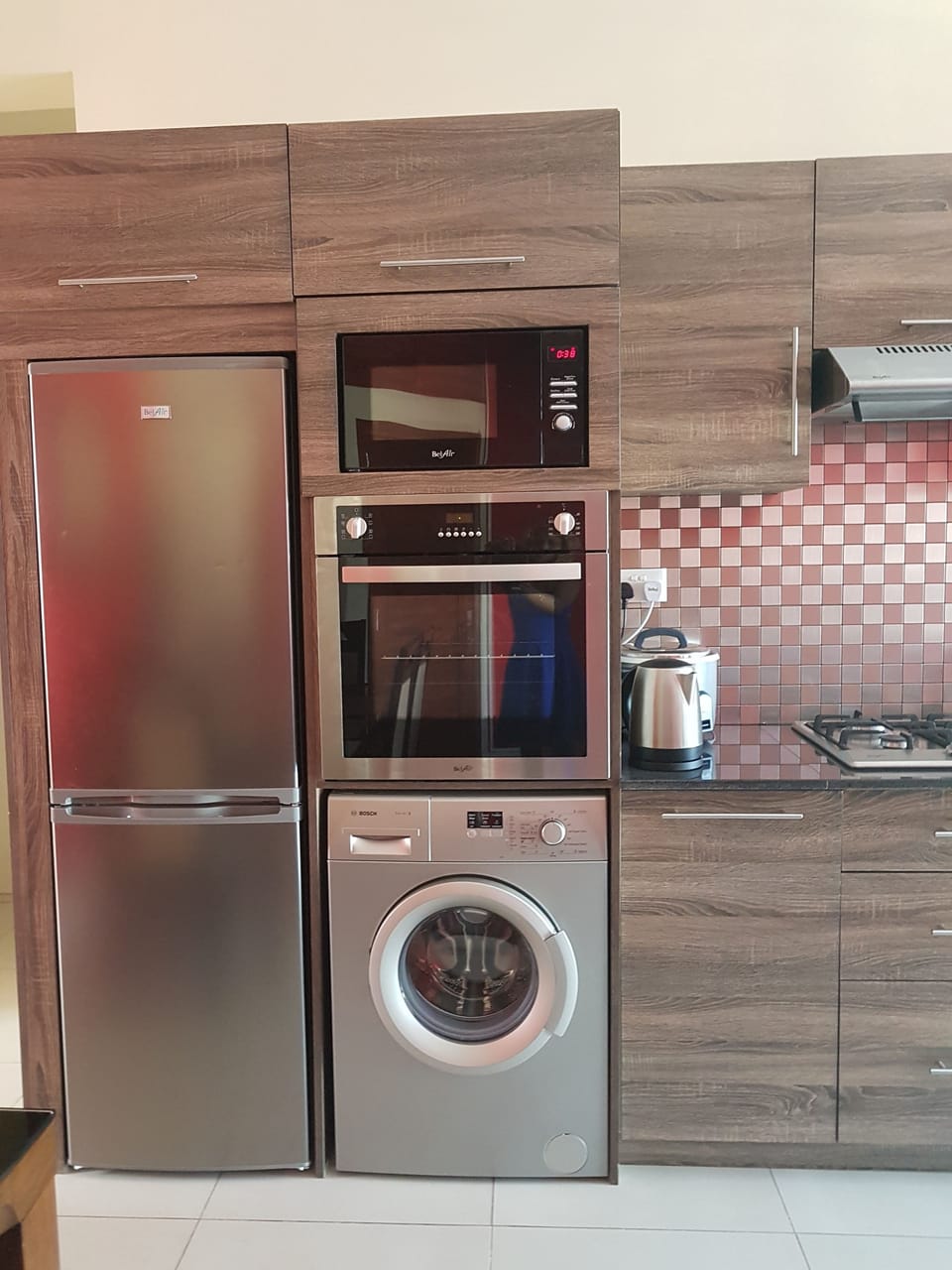 Apartment, 3 Bedrooms | Private kitchen | Coffee/tea maker, full-size fridge, microwave, oven