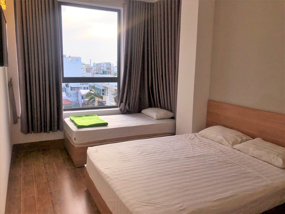 Triple Room | In-room safe, free WiFi, bed sheets