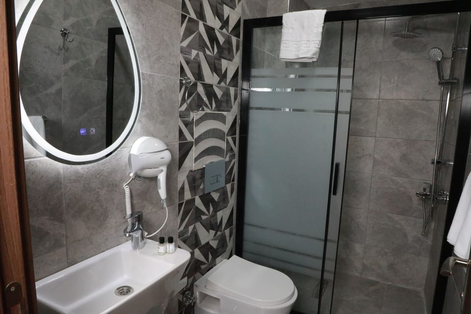 Free toiletries, hair dryer, bathrobes, slippers