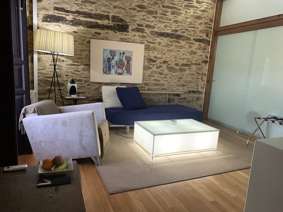 Family Studio Suite | Minibar, in-room safe, individually decorated, desk