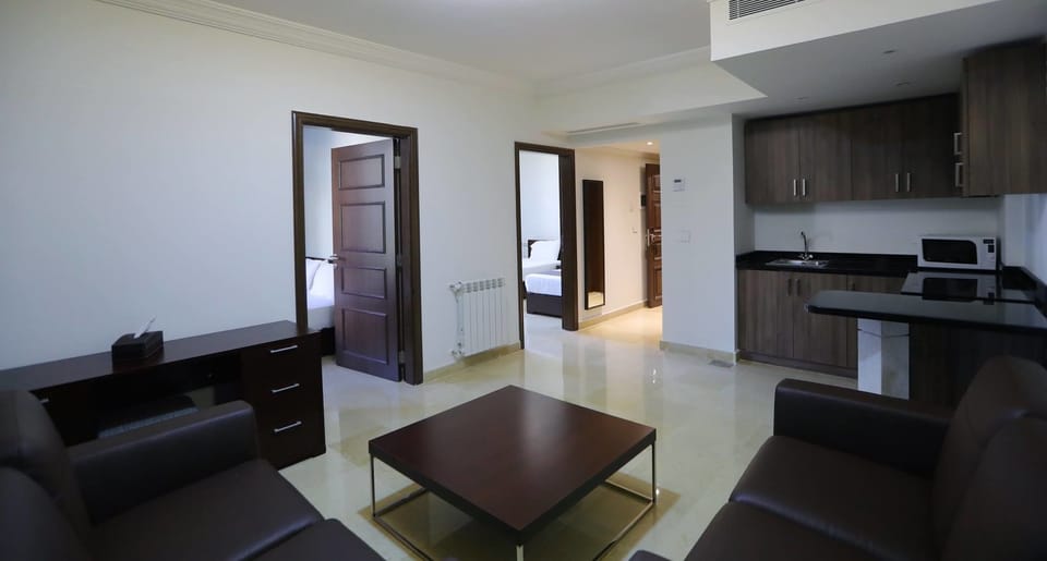 Family Suite, 2 Bedrooms | Living area | LCD TV