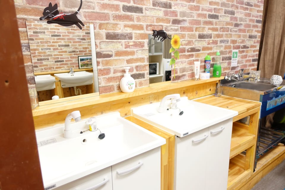 Hair dryer, slippers, towels, shampoo