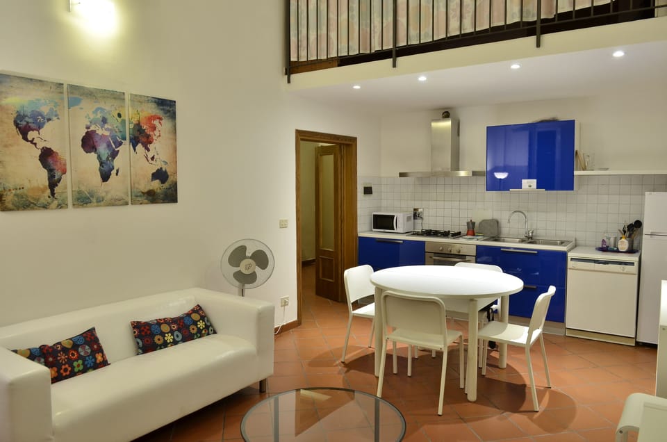 Basic Apartment, 3 Bedrooms | Living room | Flat-screen TV
