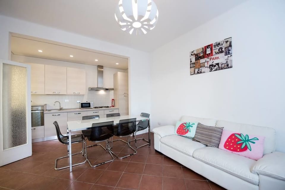 Basic Apartment, 3 Bedrooms | Living room | Flat-screen TV