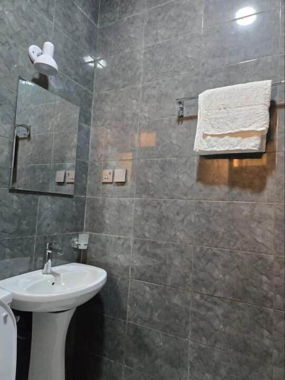 Shower, bathrobes, slippers, towels