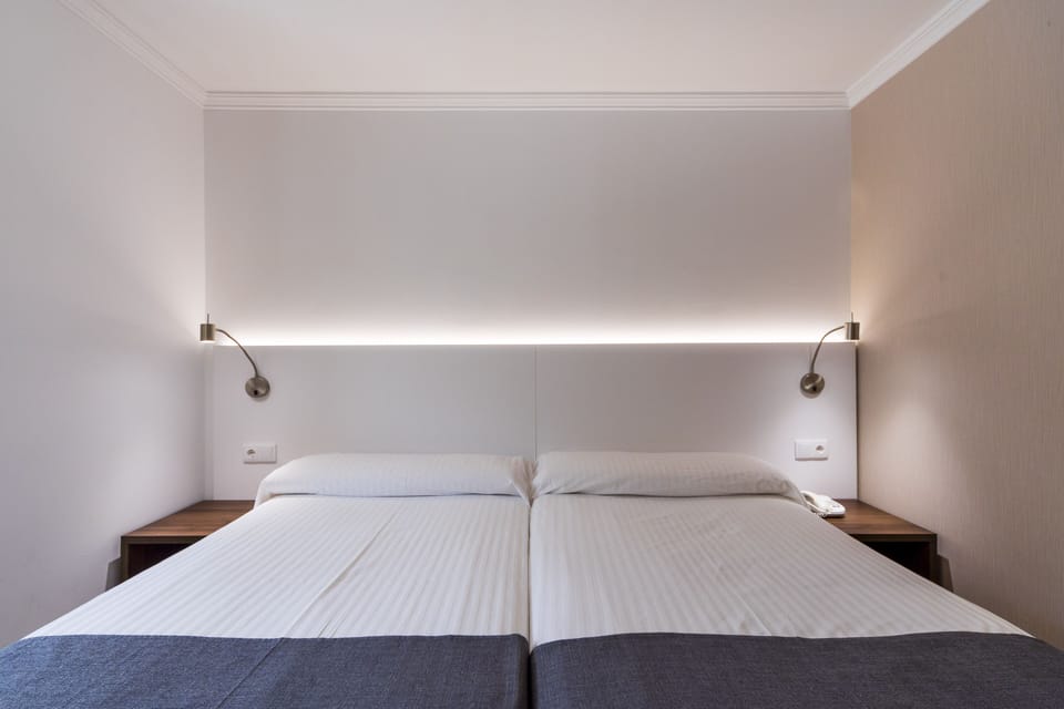Minibar, desk, blackout drapes, soundproofing