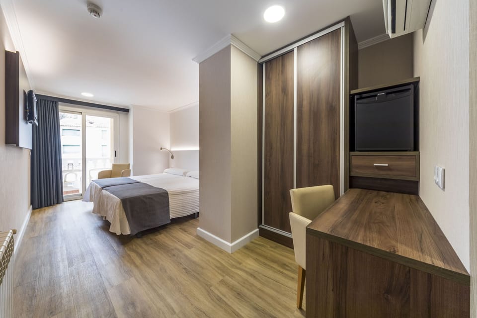 Minibar, desk, blackout drapes, soundproofing