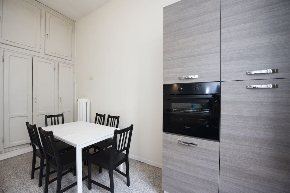 Basic Apartment, 4 Bedrooms | Private kitchen | Fridge, microwave, coffee/tea maker, cookware/dishes/utensils