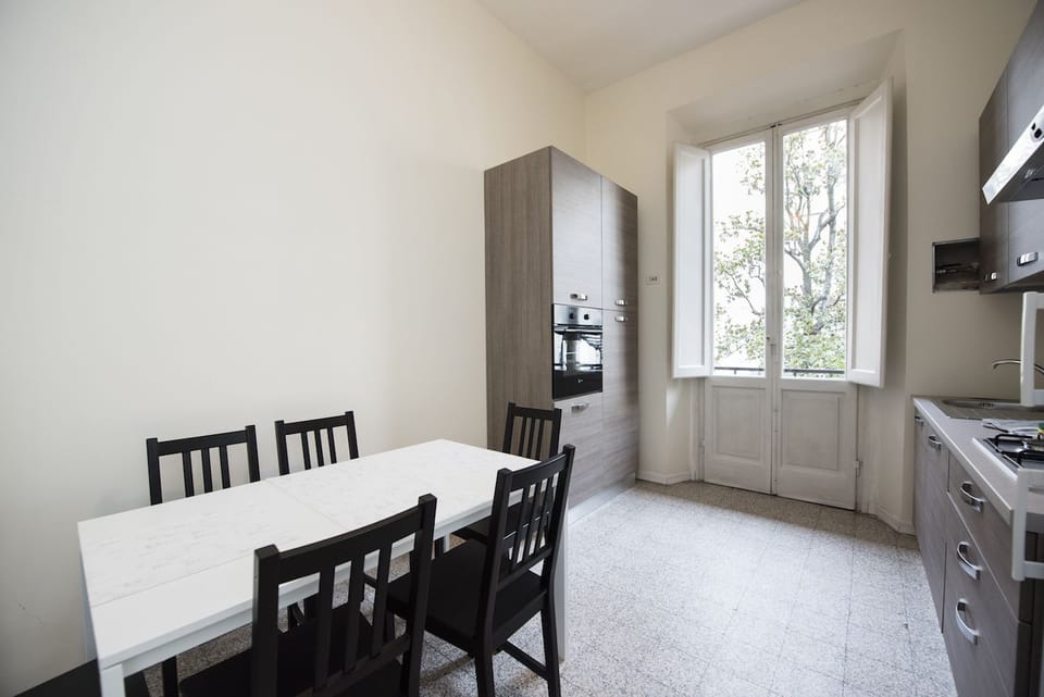 Basic Apartment, 4 Bedrooms | Private kitchen | Fridge, microwave, coffee/tea maker, cookware/dishes/utensils