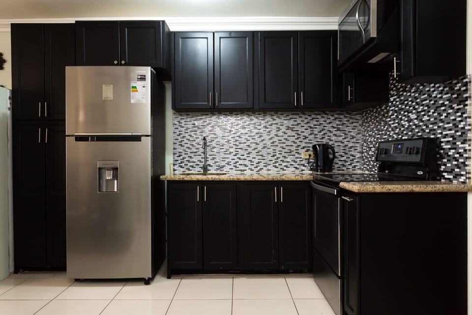 Apartment | Private kitchen | Full-size fridge, microwave, oven, stovetop