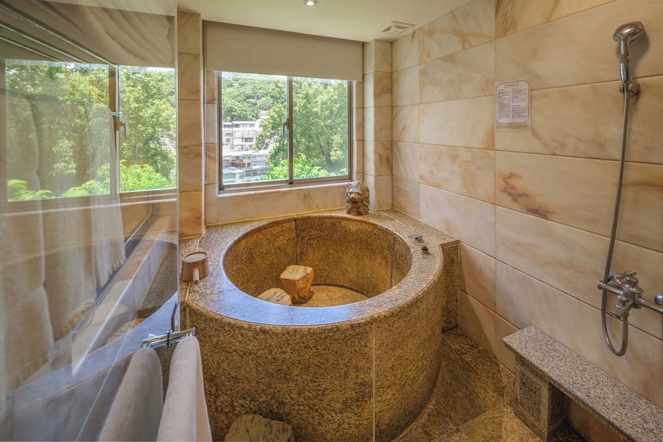 Deluxe Triple Room | Bathroom | Separate tub and shower, spring water tub, rainfall showerhead