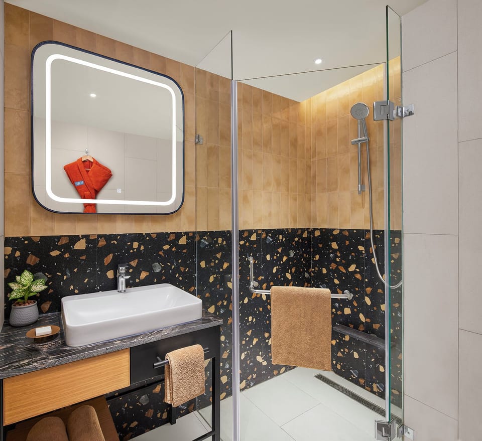 Eco-friendly toiletries, hair dryer, bathrobes, slippers