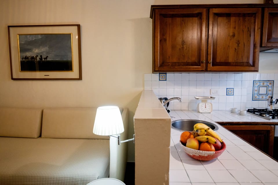 Comfort Apartment, 1 Bedroom (Azzurro) | Blackout drapes, iron/ironing board, free cribs/infant beds, free WiFi