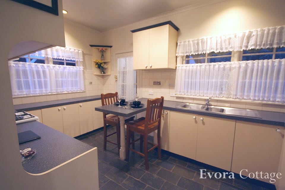 Self-contained kitchen/dining.