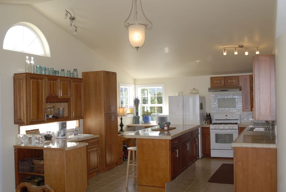 The huge gourmet kitchen is the heart of the home.