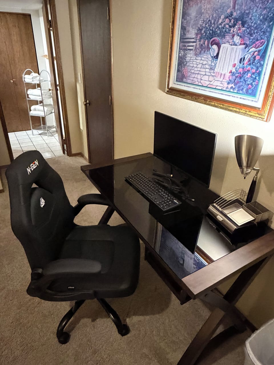 DEDICATED WORKSPACE- 2nd monitor, desk lamp, keyboard, gaming-chair and bathroom