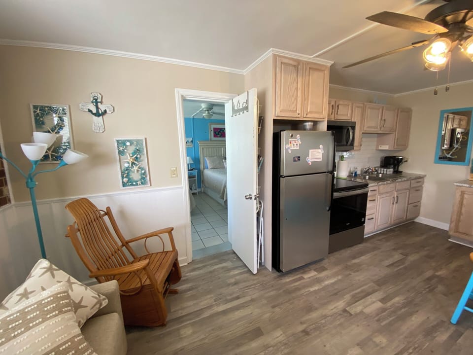 Walk through door from bathroom to kitchen