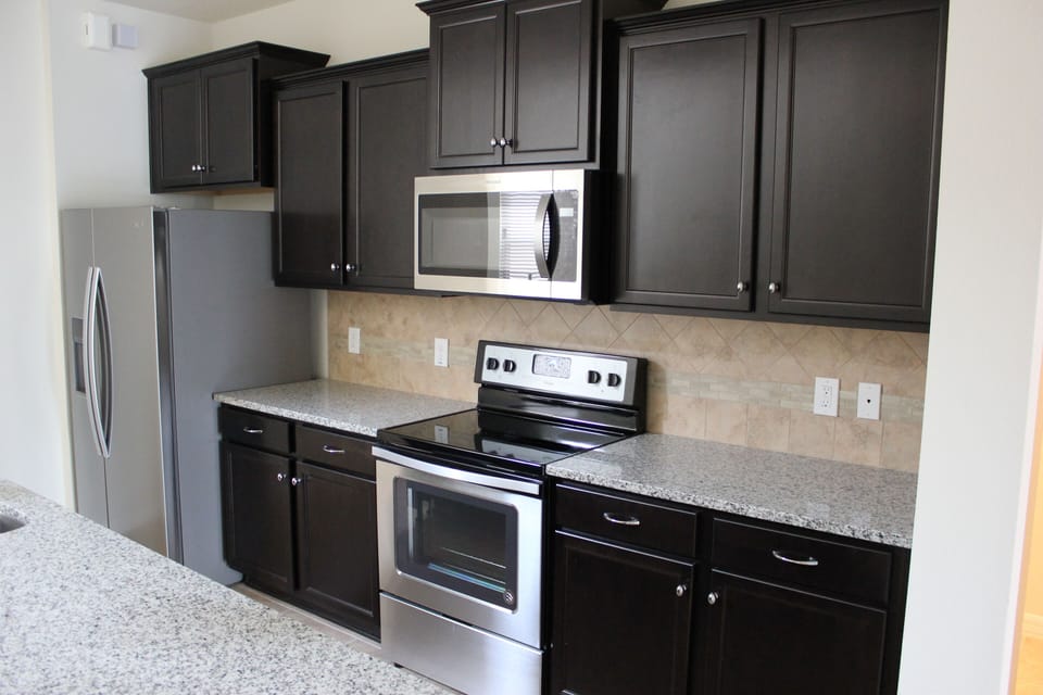Upgraded Kitchen with Granite countertop and stainless steel appliances 