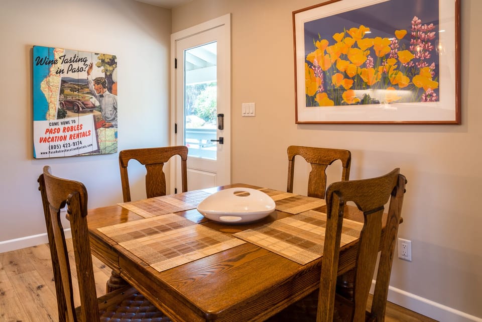 Share meals at the wood table with room for four