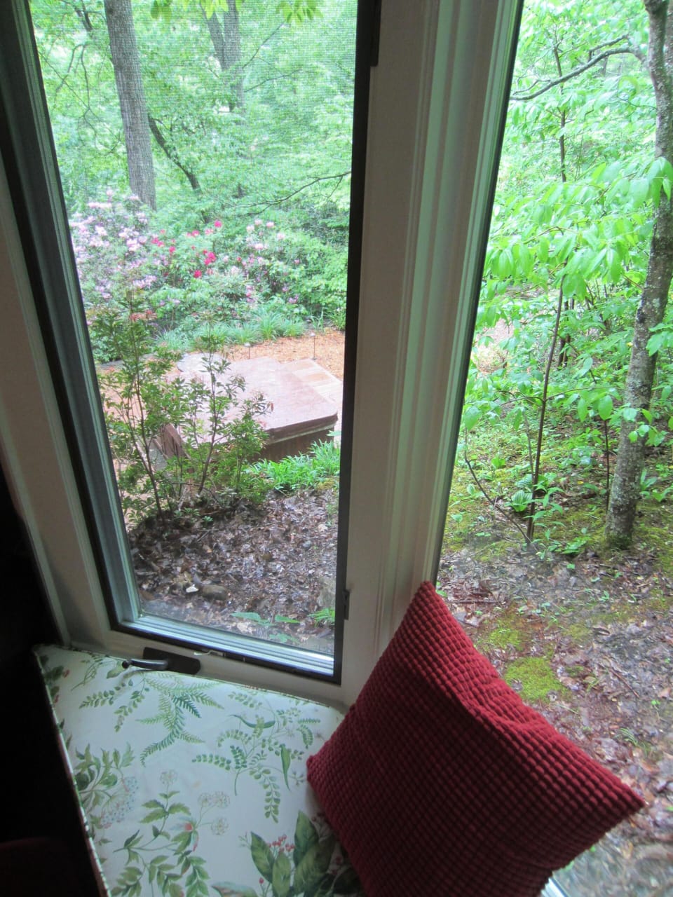 Bay window with view of hot tub