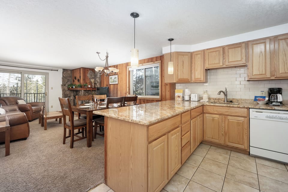 Cook together in your spacious kitchen with granite counters, then gather around the dining table for memorable meals.