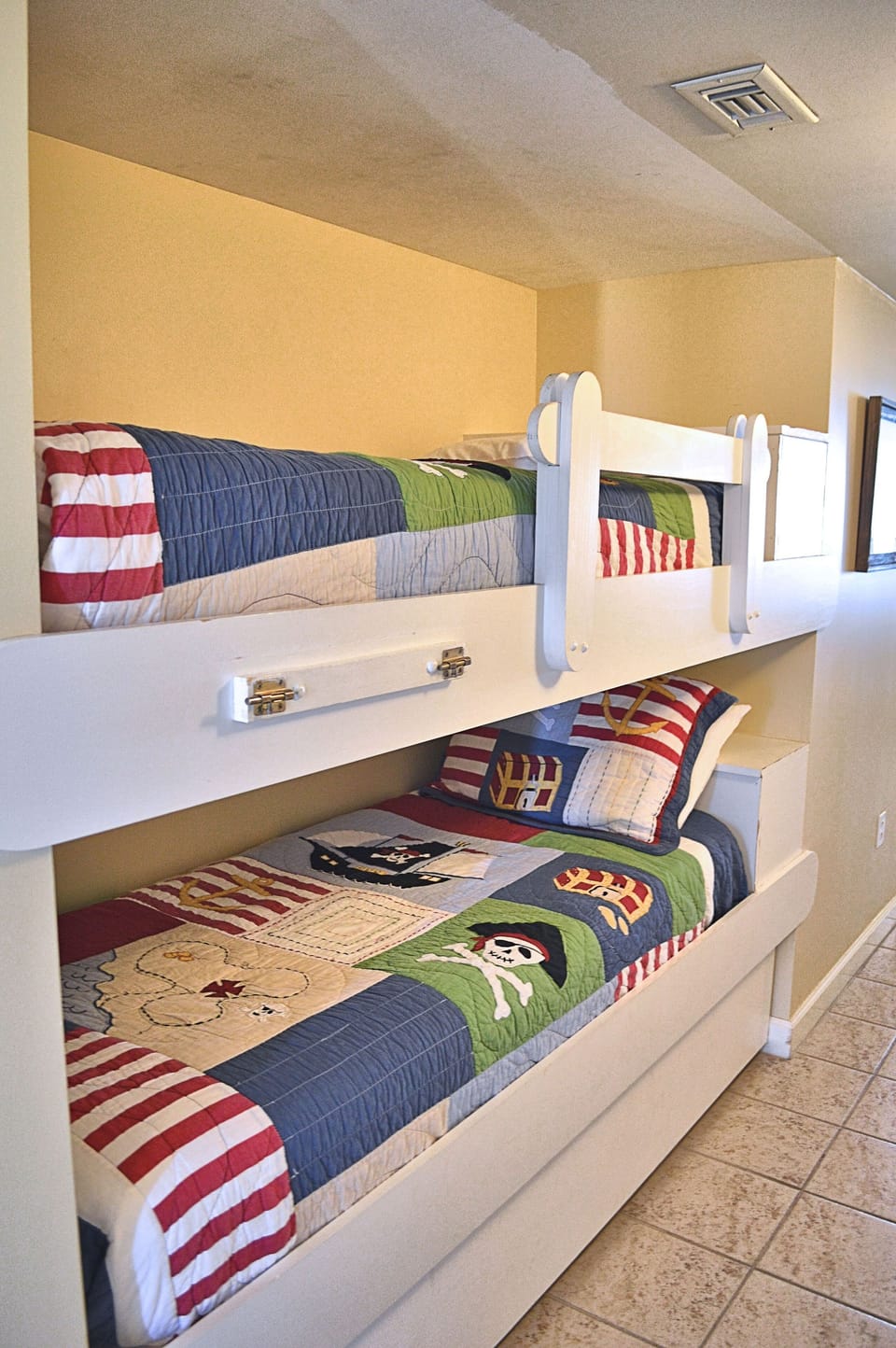 Twin bunks located in the hall before you reach the second full bathroom.