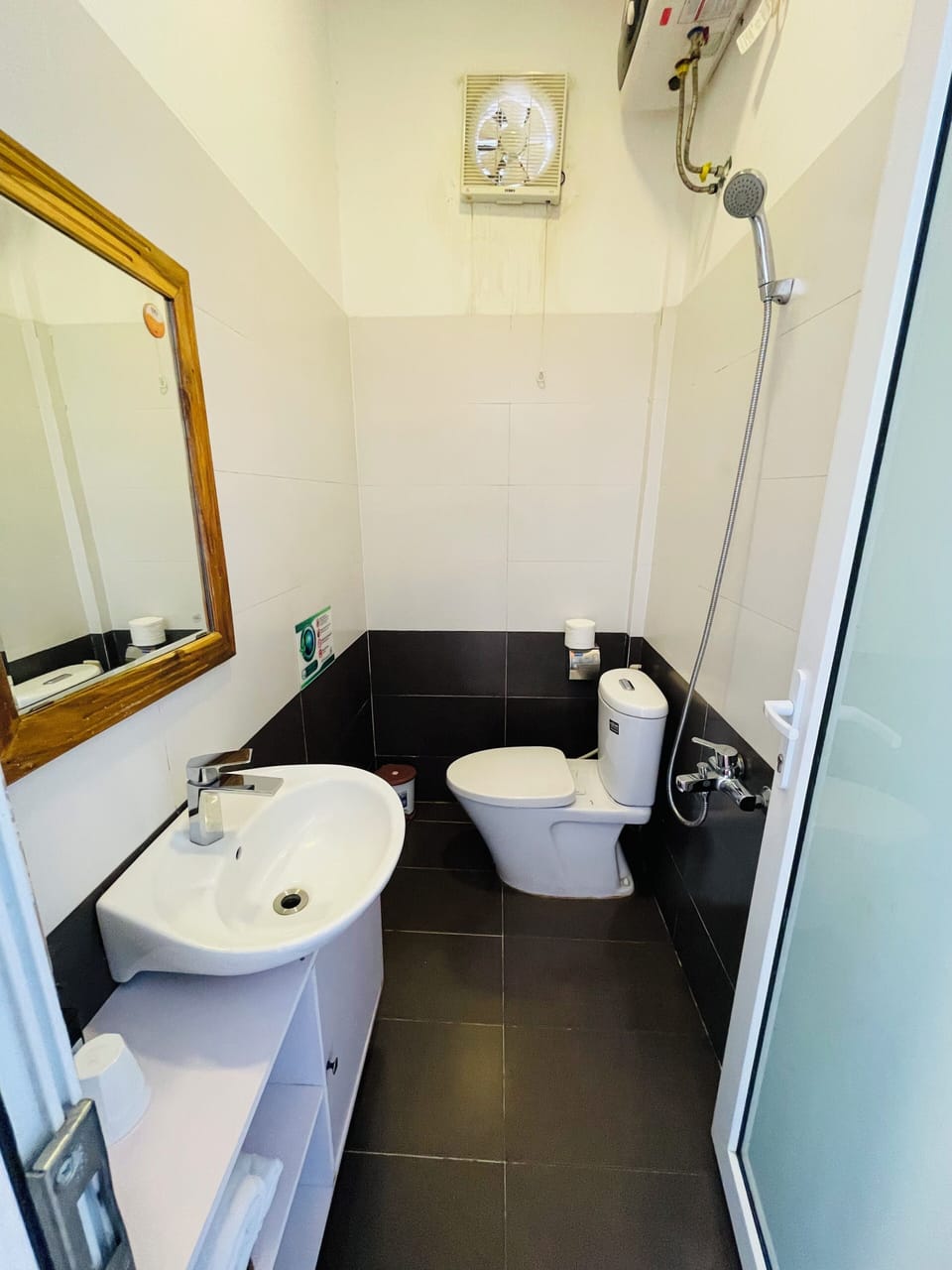 Shower, free toiletries, hair dryer, slippers