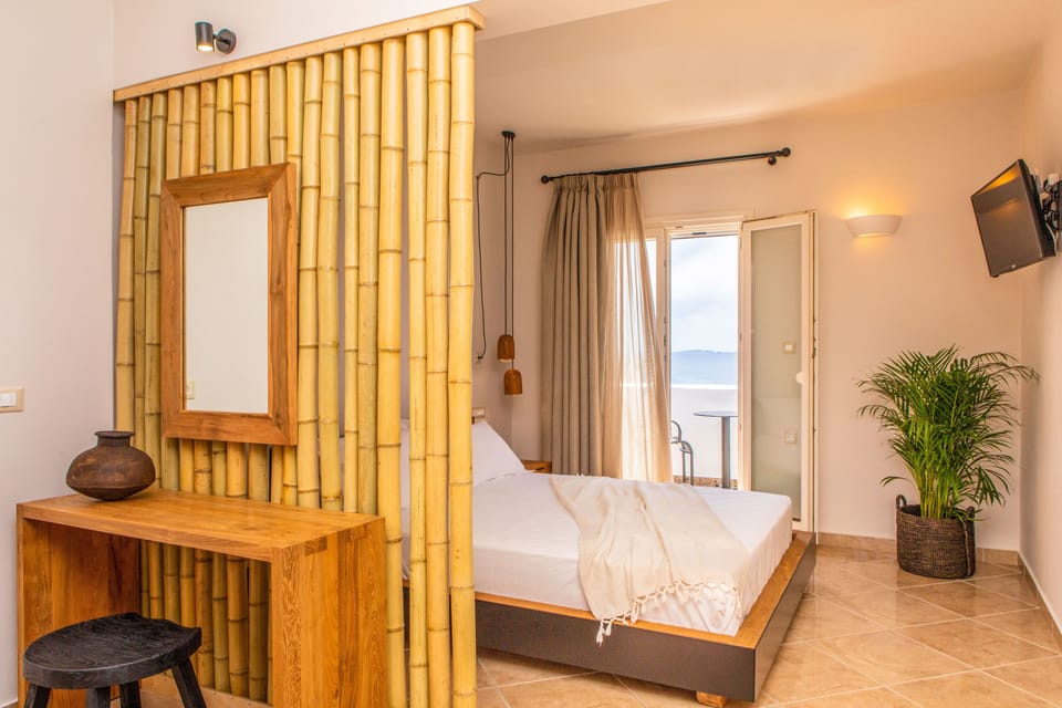 Panoramic Suite, Sea View | 1 bedroom, in-room safe, soundproofing, iron/ironing board